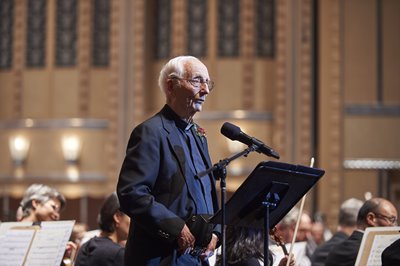 Fr. Streicher receiving the 2015 MAGIS Award